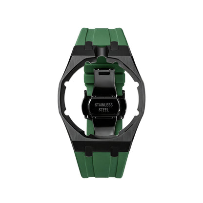 42mm black steel conversion case with green rubber strap, crown at 12 o'clock